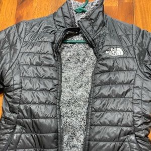 Black and gray fuzzy reversible coat.  Like new